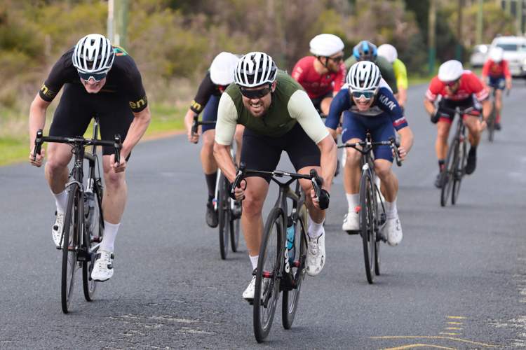 male cyclists sprinting